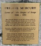 The memorial plaque at the base of Freddie Mercury statue